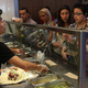 Long line of people ordering at Chipotle